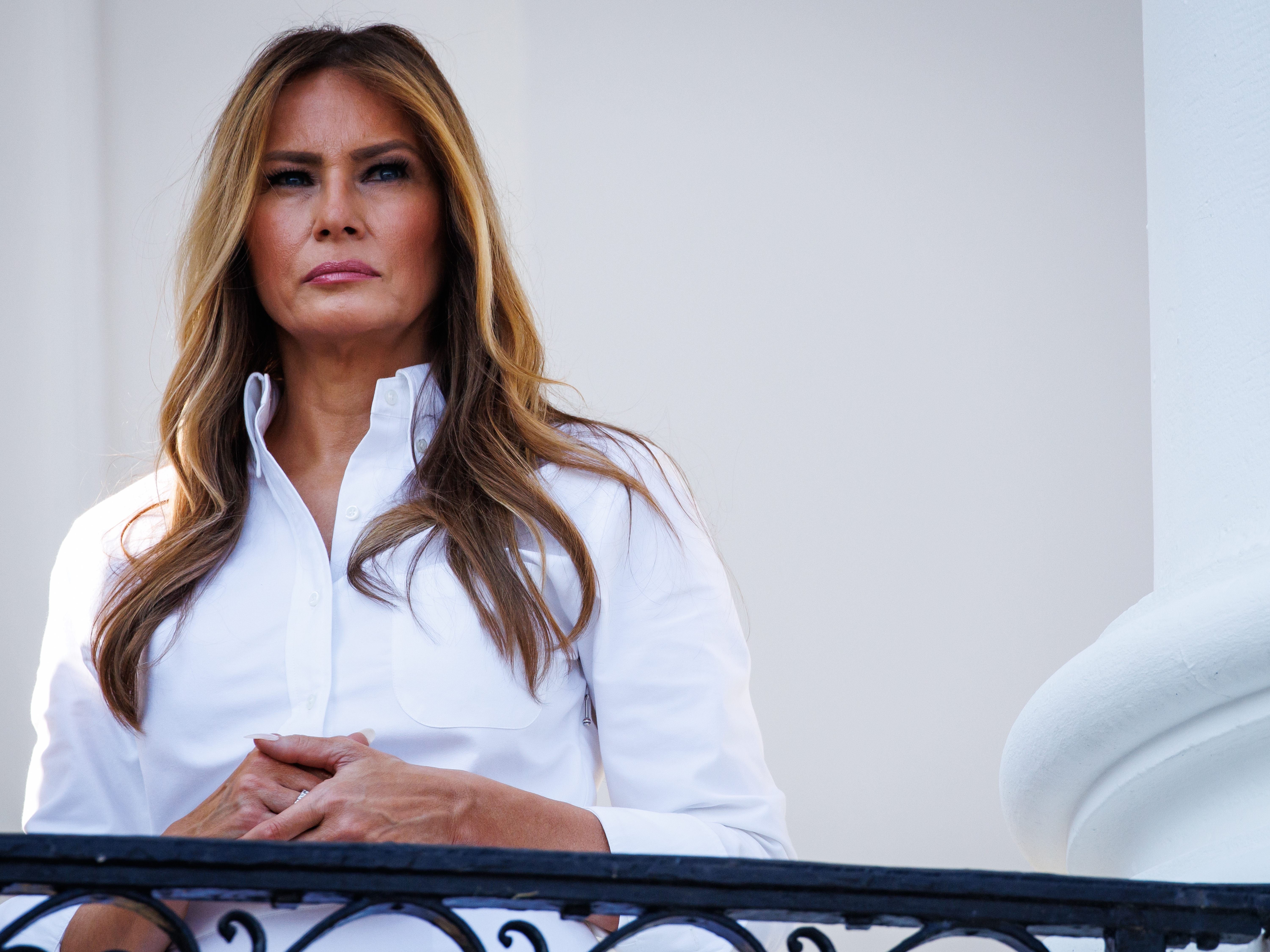 caption: First lady Melania Trump listens as U.S. President Donald Trump (not pictured) delivers remarks during an Independence Day military family picnic on the South Lawn of the White House on July 04, 2025 in Washington, DC.