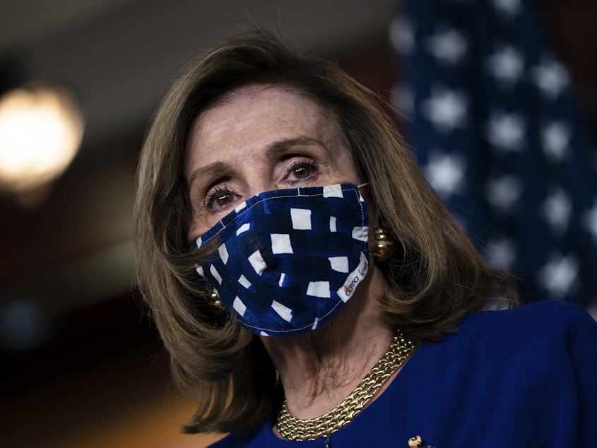 caption: House Speaker Nancy Pelosi, D-Calif., is pictured on Capitol Hill on Nov. 20. The House voted Monday to increase direct payments to Americans above what is provided in the COVID-19 relief legislation President Trump signed on Sunday.