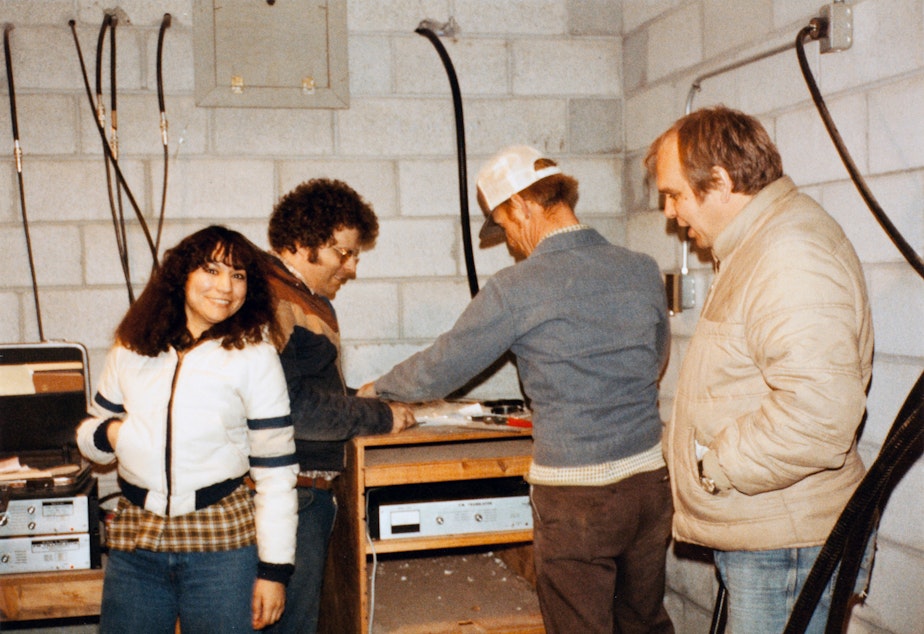 caption: KDNA founders Rosa Ramón (far left) and Dan Roble (left).