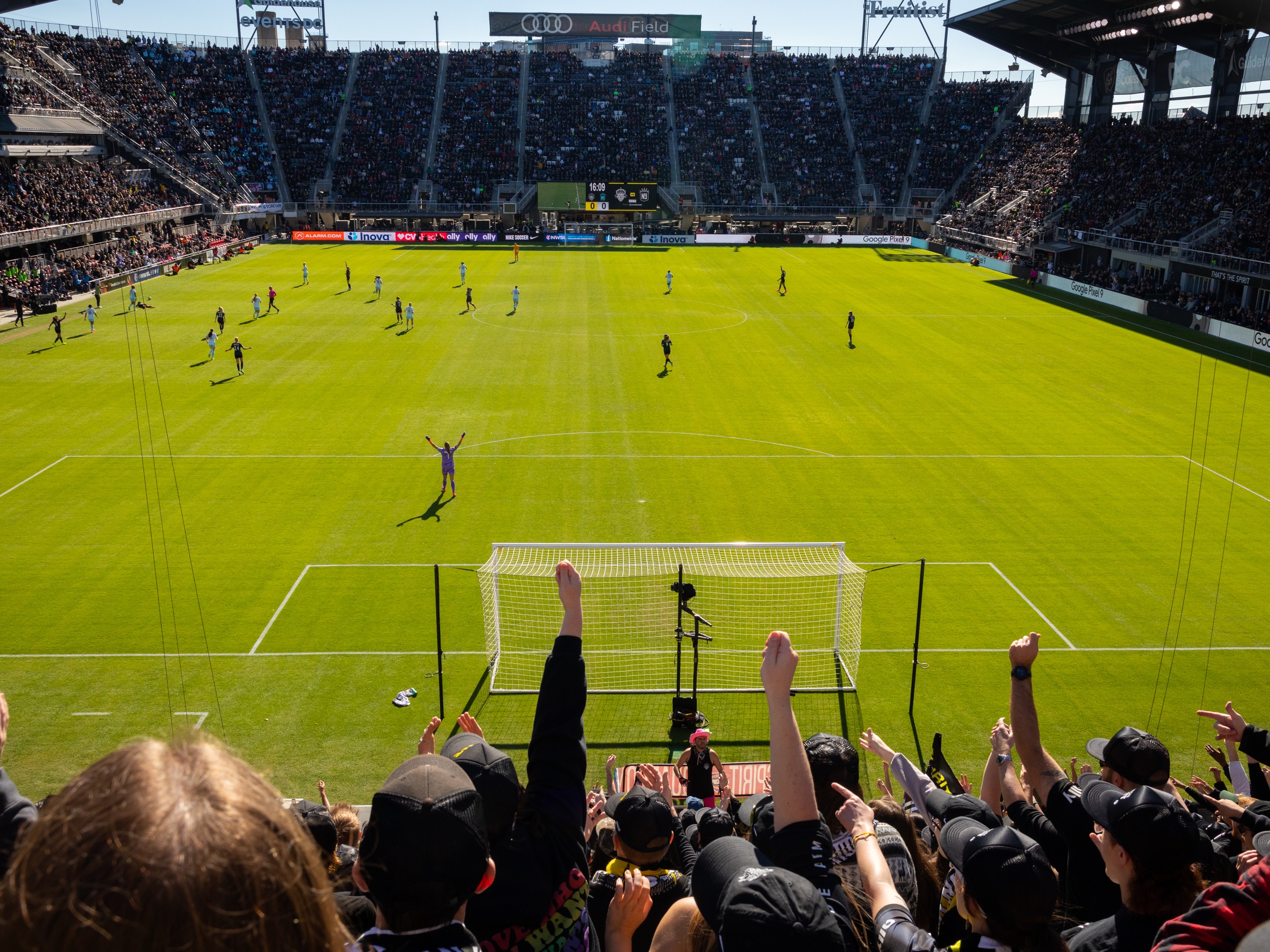 caption: Fans of the Washington Spirit team cheer during the NWSL semifinals in November. In 2021, revelations about sexual misconduct and racism roiled the NWSL and sparked investigations. Now, the women's soccer league will set aside $5 million for victims and implement other reforms.