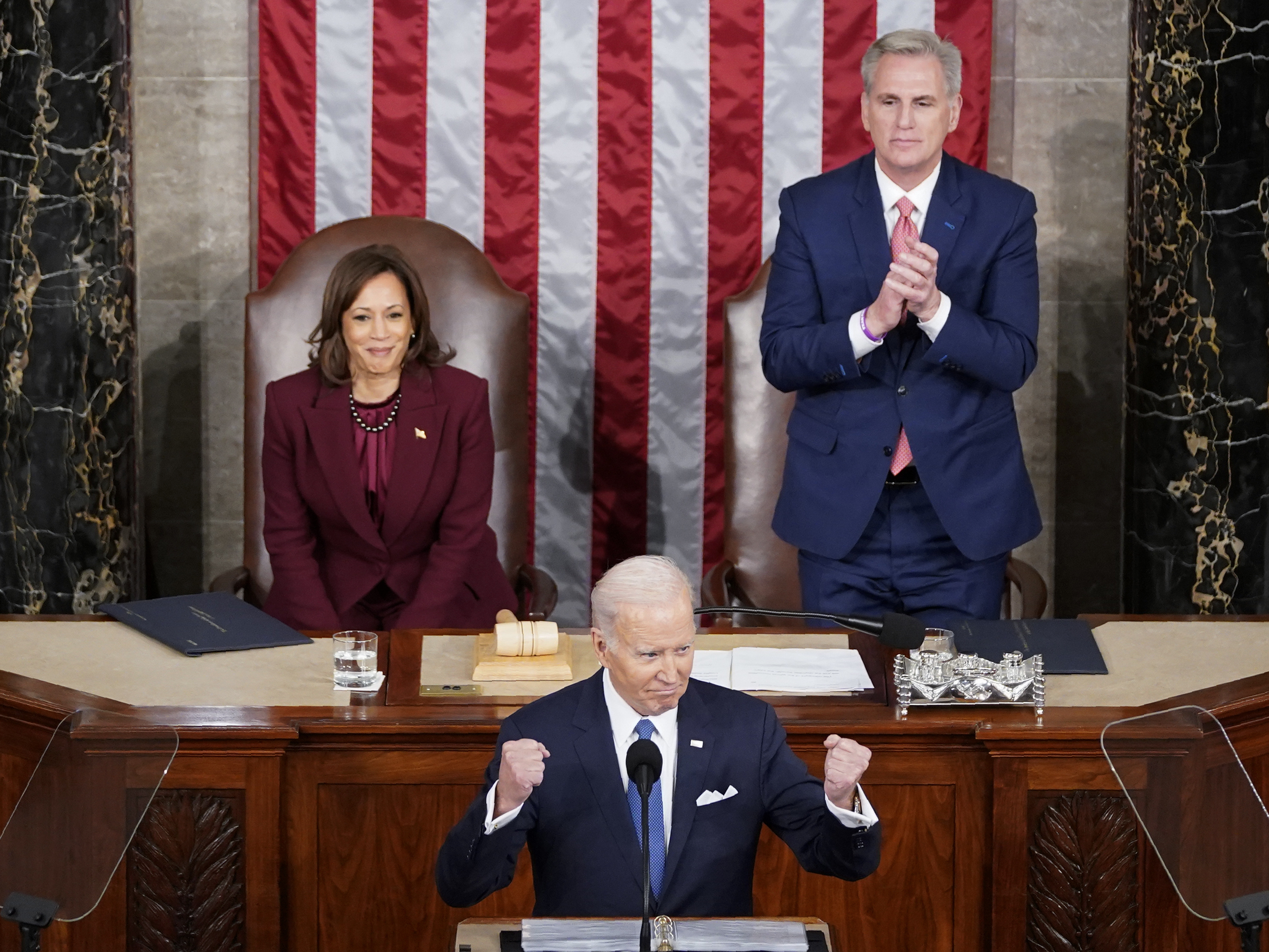 caption: Vice President Harris and Speaker of the House Kevin McCarthy listen as President Biden delivers his State of the Union address.