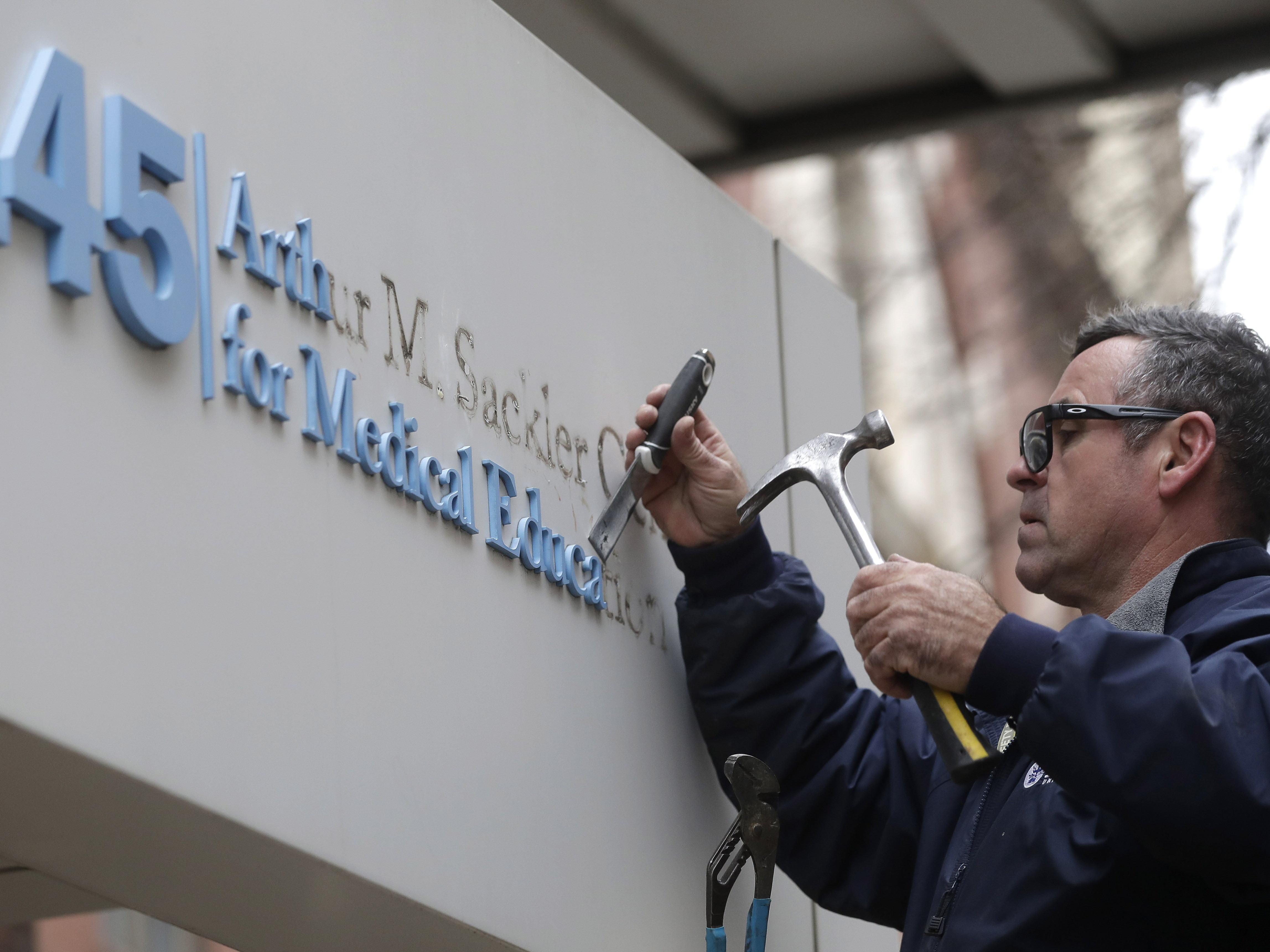 caption: Tufts University stripped the Sackler name from several of its buildings and divisions earlier this month, citing the billionaire family's role in the opioid crisis. The founders of Purdue Pharma have come under intense scrutiny for how their company misled doctors and patients about the addictiveness of its signature medication.