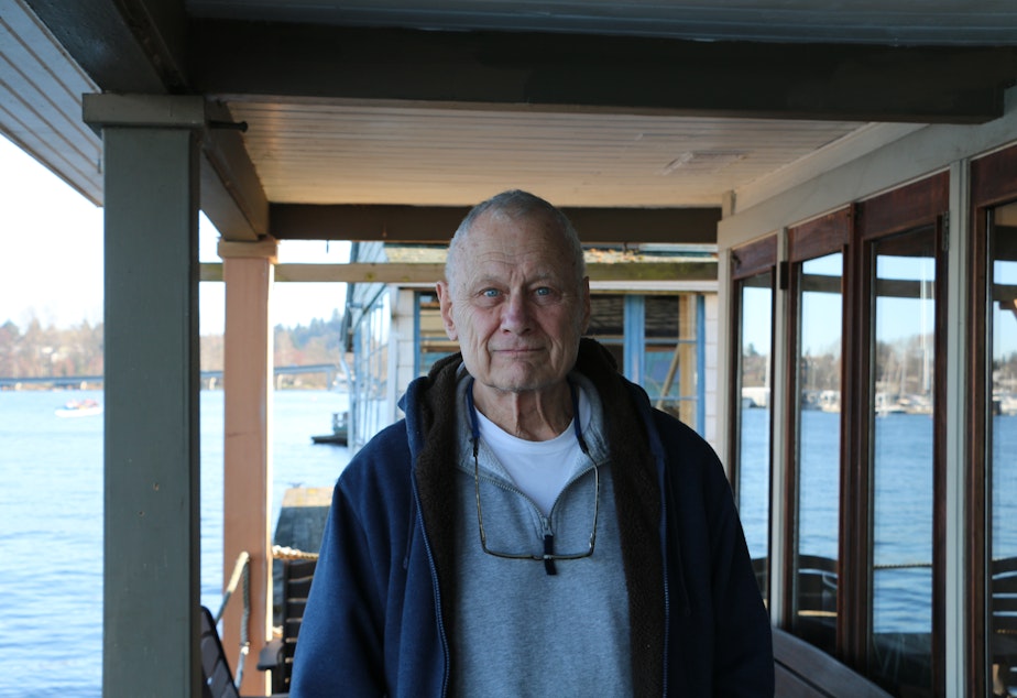 caption: Mack has lived on a houseboat in Seattle's Portage Bay since 1968.