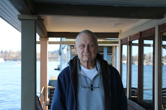 caption: Mack has lived on a houseboat in Seattle's Portage Bay since 1968.