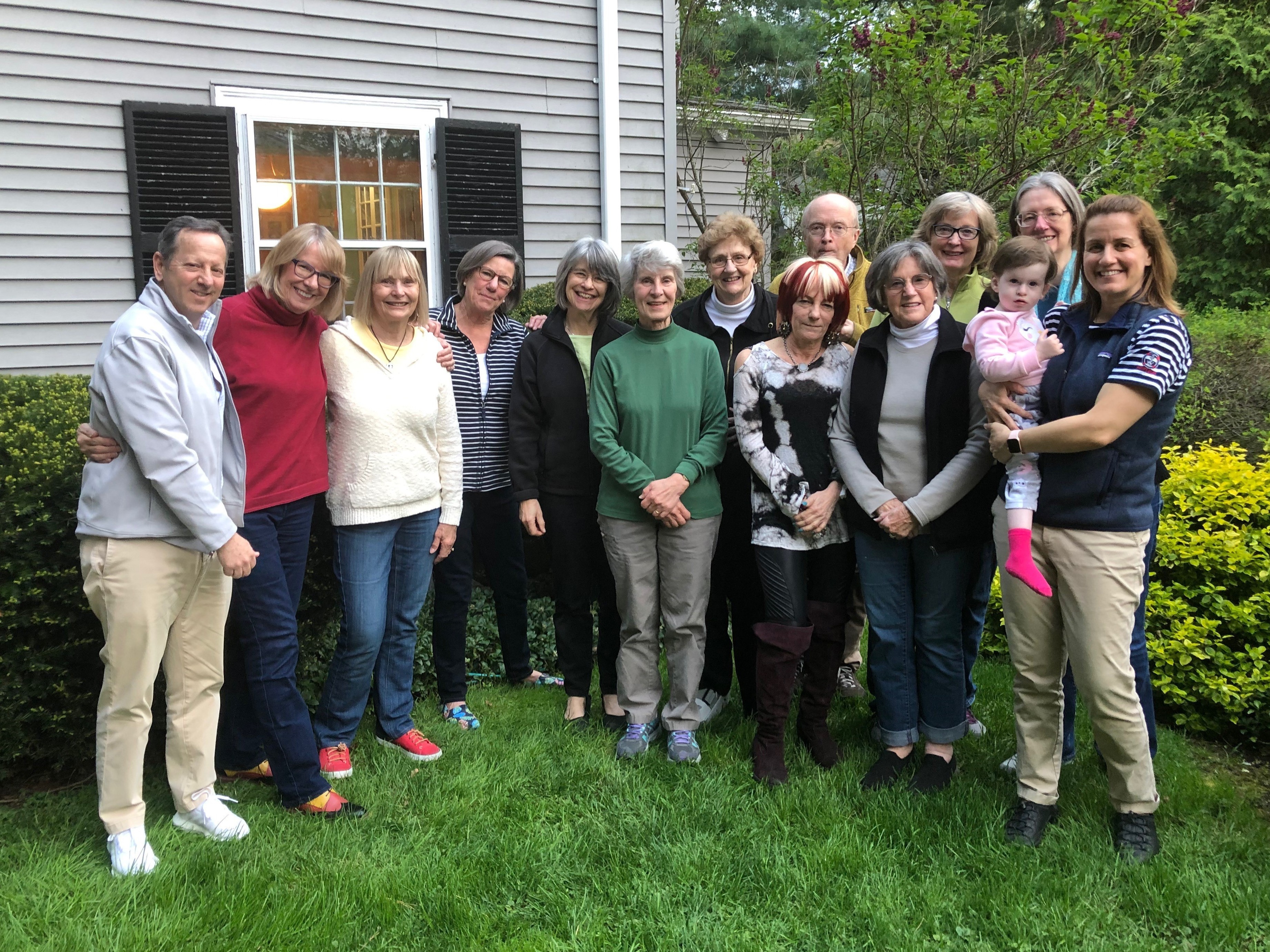 caption: Many residents of a close-knit neighborhood in Newton, Mass., decided to learn American Sign Language when they found out the new kid on the block, Samantha Savitz, was born deaf.