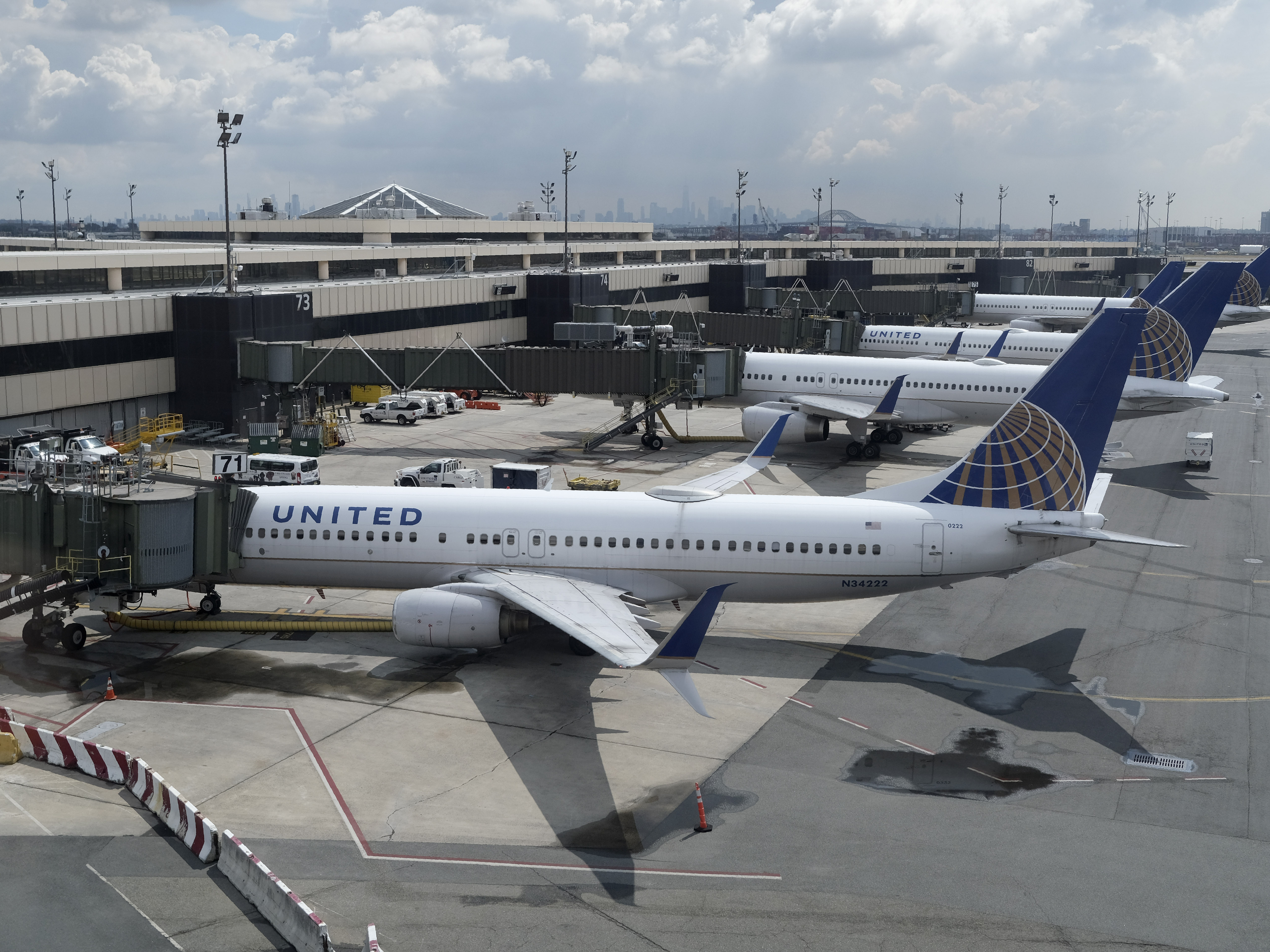 caption: United Airlines planes at Newark Liberty International Airport in Newark, N.J. Company executives call the COVID-19 pandemic the worst crisis in the airline's history.