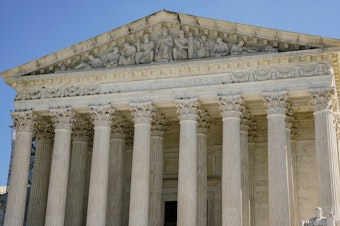 caption: The Supreme Court heard arguments in a case examining a federal-state conflict over emergency abortions.