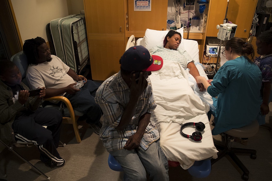 caption: Tiffany Hicks is induced early on Monday, August 28, 2017, because of problems with gestational hypertension, at Swedish First Hill Birth Center on Broadway St., in Seattle. 