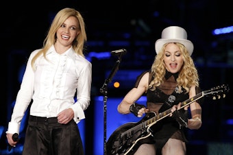 caption: Britney Spears, left, joins Madonna for a guest appearance during one of Madonna's Los Angeles tour dates in 2008.