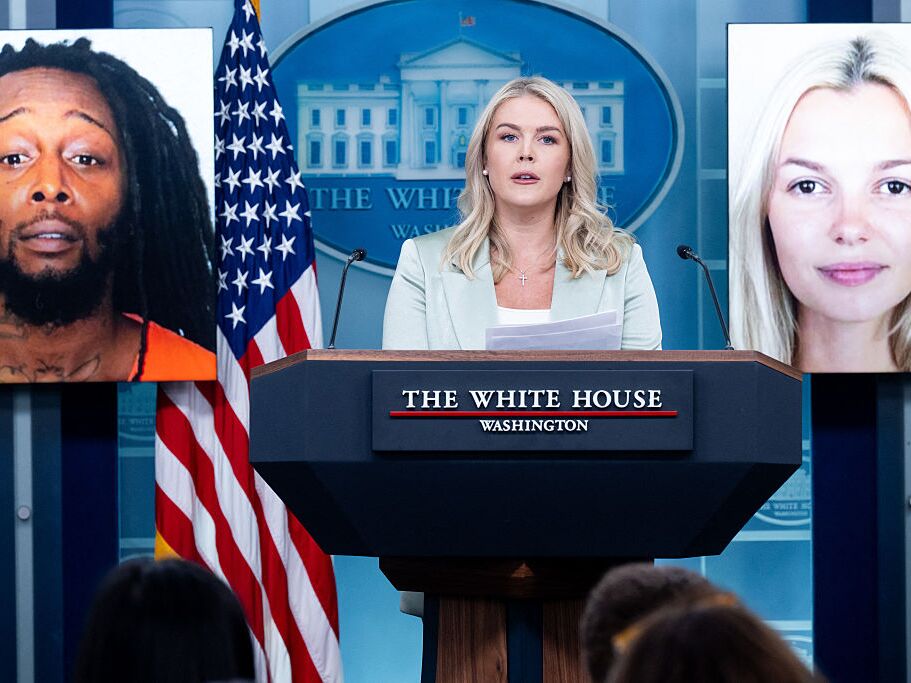 caption: White House Press Secretary Karoline Leavitt speaks alongside a photo of Ukrainian refugee Iryna Zarutska (right), who was allegedly killed by Decarlos Brown Jr. (left), on a light rail train in Charlotte, N.C.