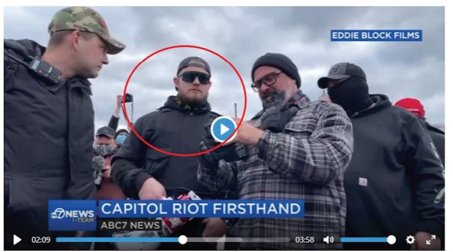 caption: Federal prosecutors say this image shows Ethan Nordean in a crowd of Proud Boys who participated in storming the U.S. Capitol on Jan. 6. 