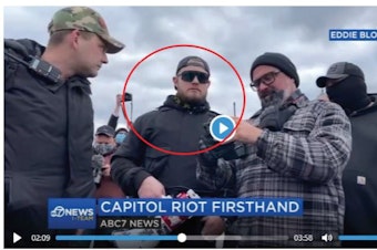 caption: Federal prosecutors say this image shows Ethan Nordean in a crowd of Proud Boys who participated in storming the U.S. Capitol on Jan. 6. 