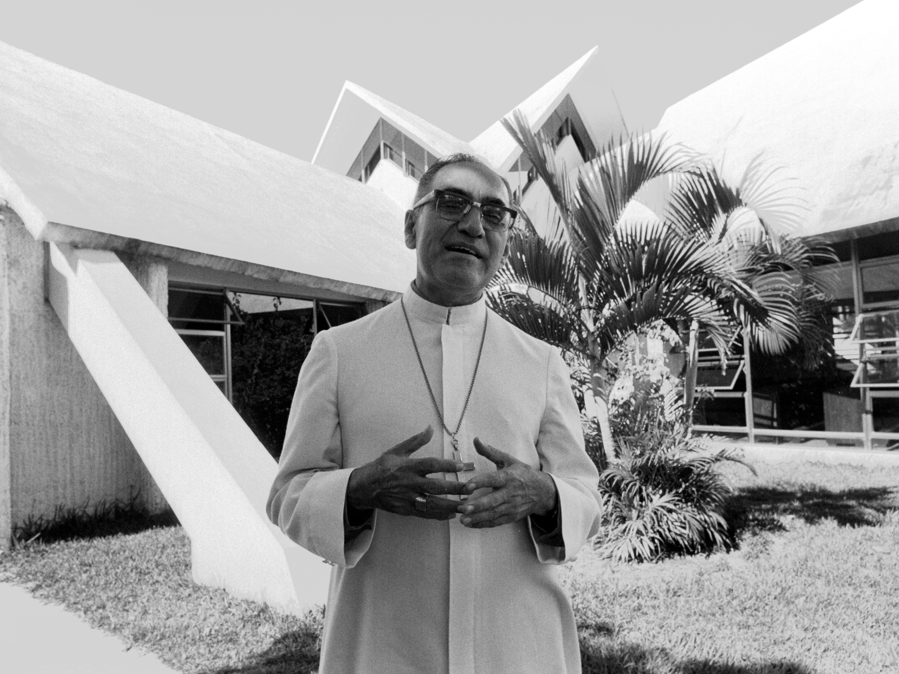caption: Archbishop Óscar Romero stands outside the chapel of the Hospital de la Divina Providencia in San Salvador on Nov. 20, 1979.