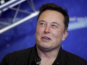 caption: SpaceX owner and Tesla CEO Elon Musk is captured this Dec. 1, 2020, file photo,