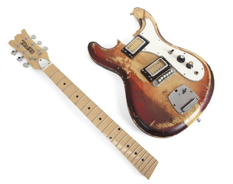 caption: A hand-painted and smashed Univox electric guitar
owned by Kurt Cobain, donated to MoPOP from the estate of the late Paul Allen in July 2023. 