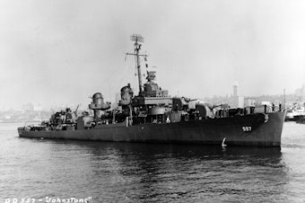 caption: USS Johnston (DD-557) off Seattle or Tacoma, Washington, 27 October 1943. 