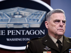 caption: Gen. Mark Milley, chairman of the Joint Chiefs of Staff, attends a media briefing earlier this year at the Pentagon. He told NPR on Thursday that the U.S. military is still considering "a whole series of protocols" when it comes to the coronavirus.