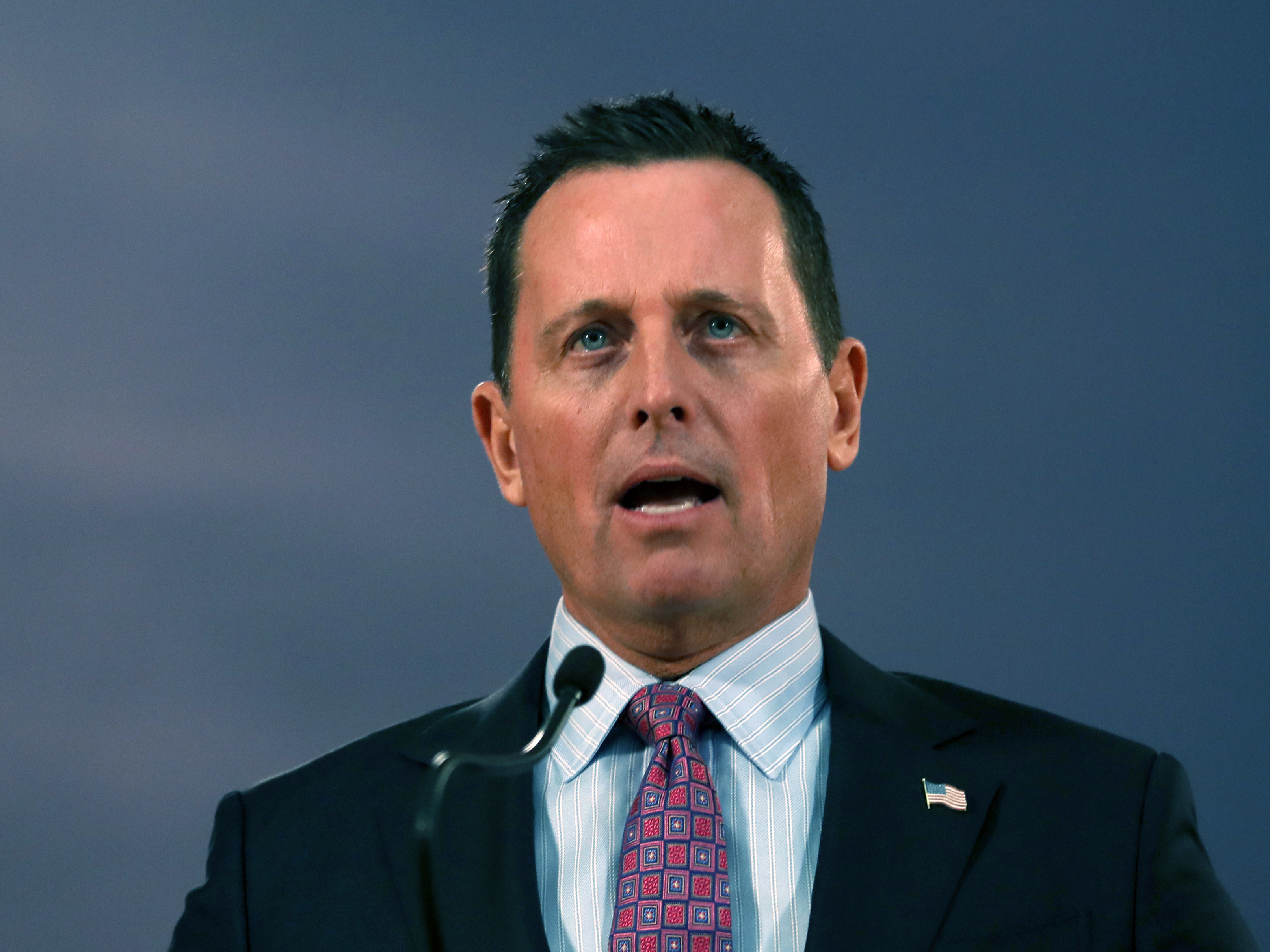 caption: U.S. Ambassador to Germany Richard Grenell speaks during a news conference after a meeting with Serbian President Aleksandar Vucic in Belgrade, Serbia, last month.