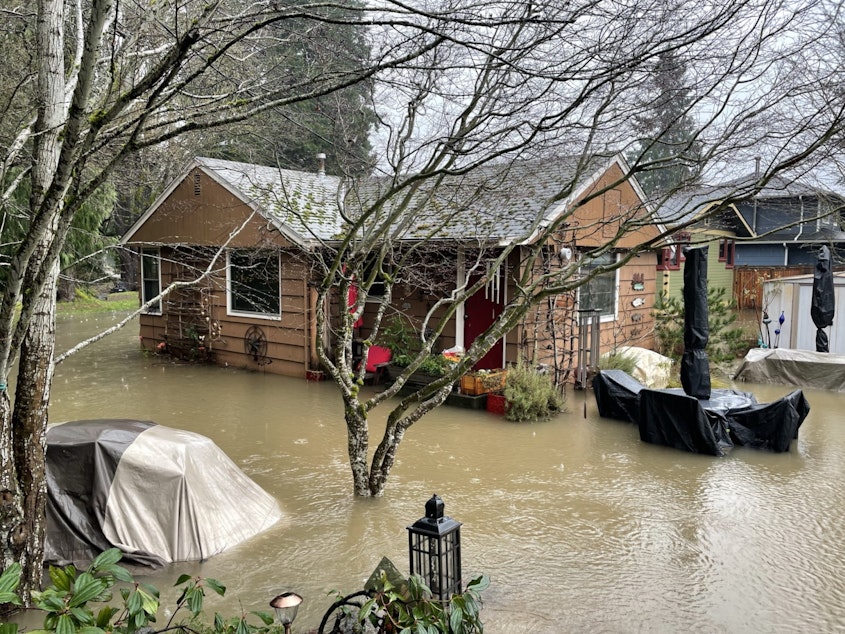 caption: A flooded home on NE Dogwood Street in Issaquah, January 7, 2022.