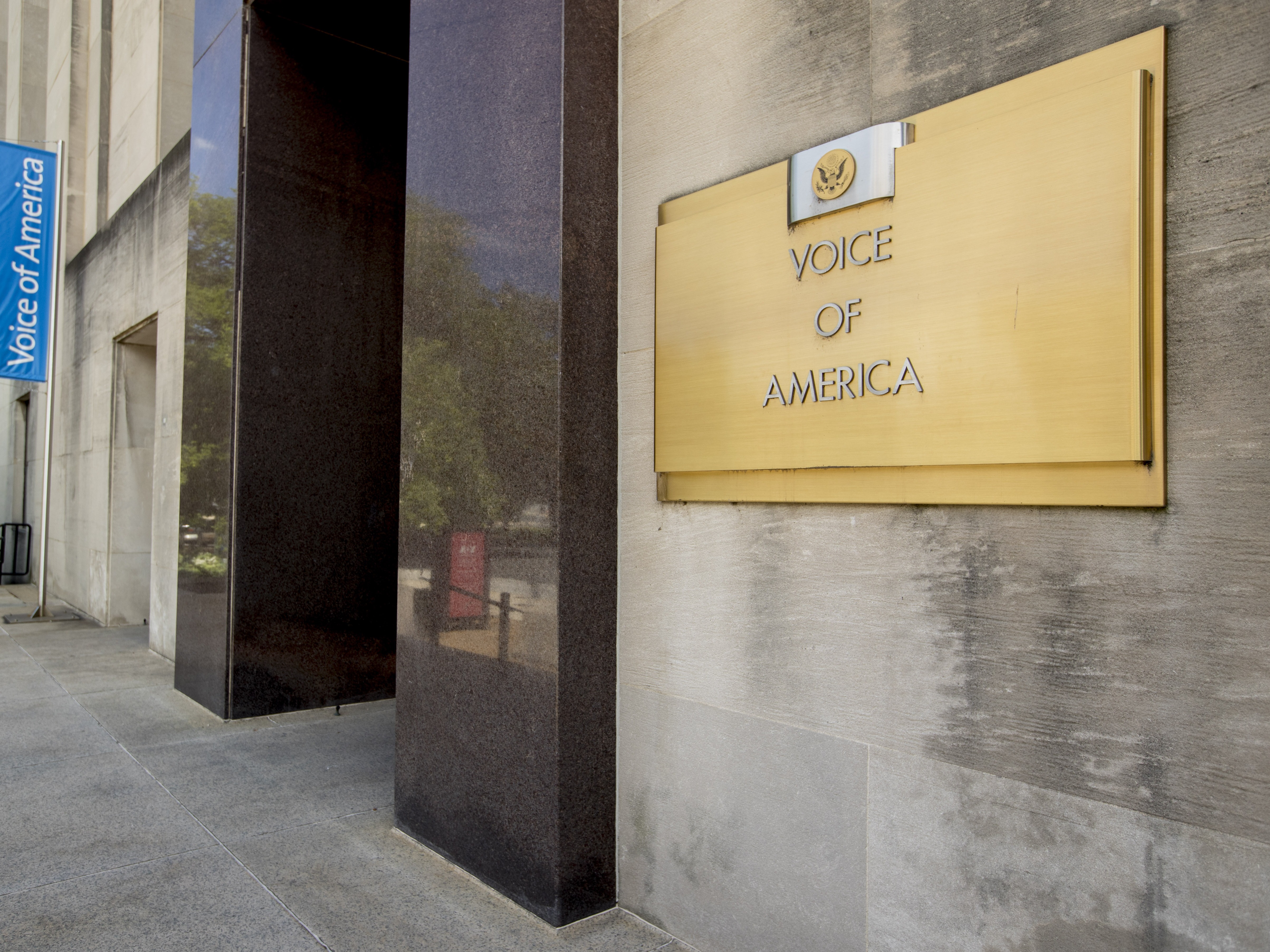 caption: President Trump's late-night decree Friday led to orders gutting the Voice of America and other U.S.-funded international broadcasters.