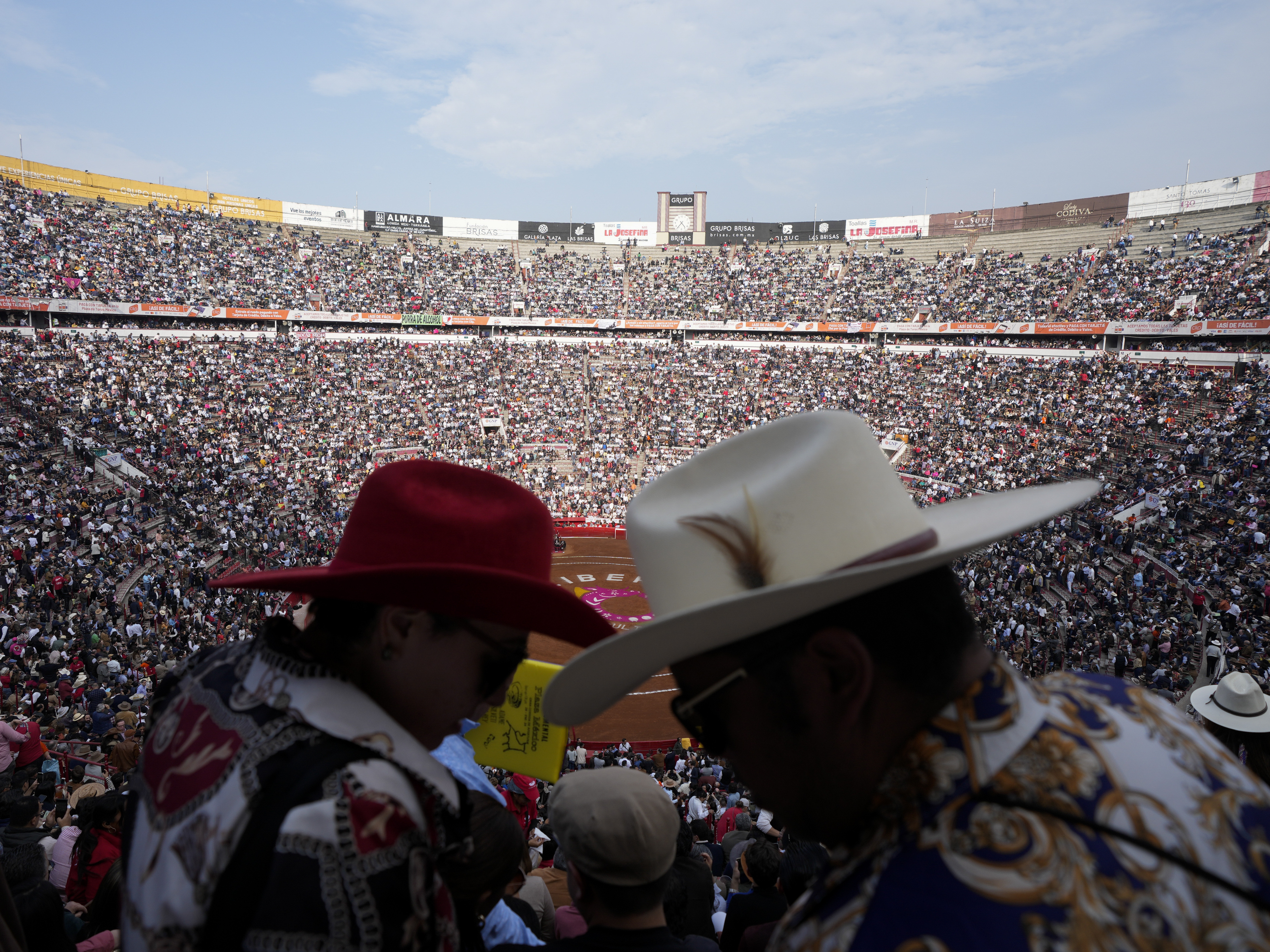 caption: Spectators wait for the start of a bullfight at the Plaza México, in Mexico City, Jan. 28. Bullfighting returned to Mexico City after the Supreme Court of Justice overturned a 2022 ban that prevented these events from taking place in the capital.