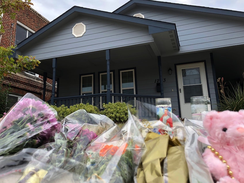 caption: Bouquets of flowers and stuffed animals are piling up outside the Fort Worth, Texas, home of 28-year-old Atatiana Jefferson, who was shot to death early Saturday morning by a police officer.