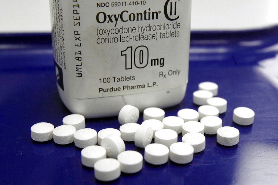 caption: OxyContin pills arranged for a photo at a pharmacy, Feb. 19, 2013 in Montpelier, Vt.