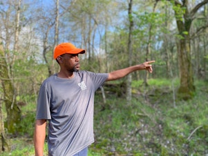 caption: Deemmeris Debra'e Burns shows the spot on a rural road in Satartia, Miss., where he lost consciousness when a carbon dioxide pipeline ruptured, an experience he thinks is a warning for America.