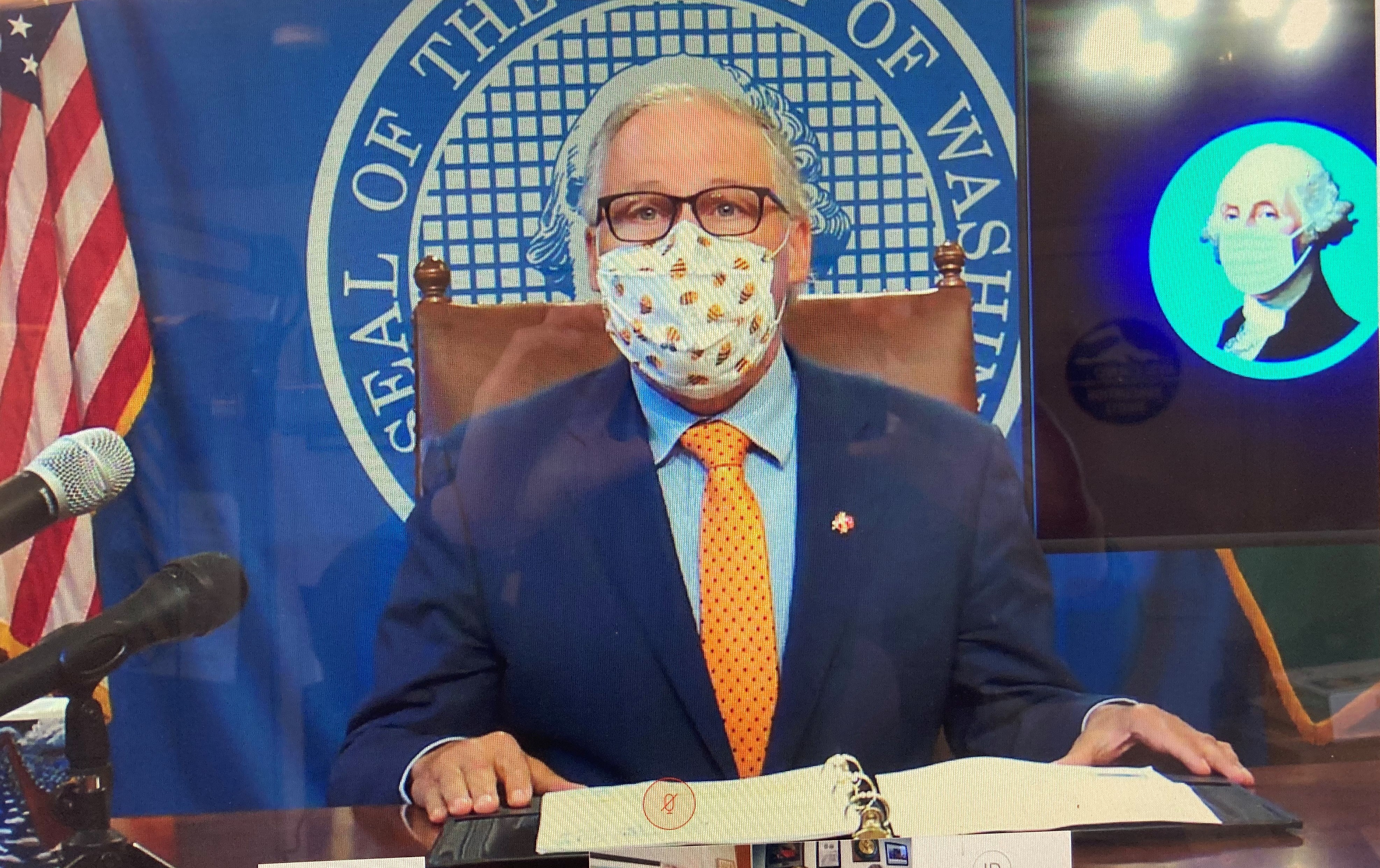 caption: Washington Gov. Jay Inslee announced a two week pause in further reopening via video conference Thursday.