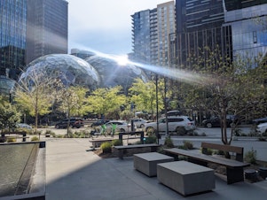 caption: A quiet scene outside Amazon's Seattle headquarters.