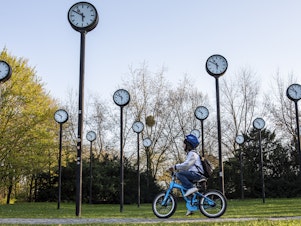 caption: The <em>Zeitfeld</em> (<em>Time Field</em>) clock installation by Klaus Rinke is seen at a park in Düsseldorf, Germany, in 2019.