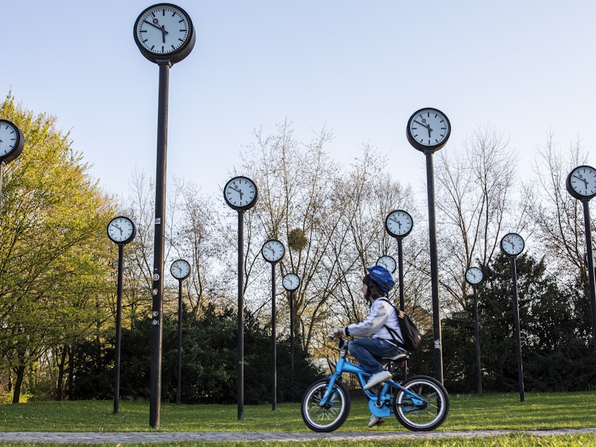 caption: The <em>Zeitfeld</em> (<em>Time Field</em>) clock installation by Klaus Rinke is seen at a park in Düsseldorf, Germany, in 2019.
