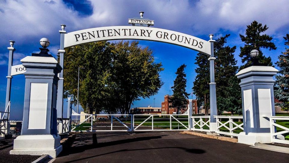 caption: The entrance to the grounds of the Washington State Penitentiary in Walla Walla.