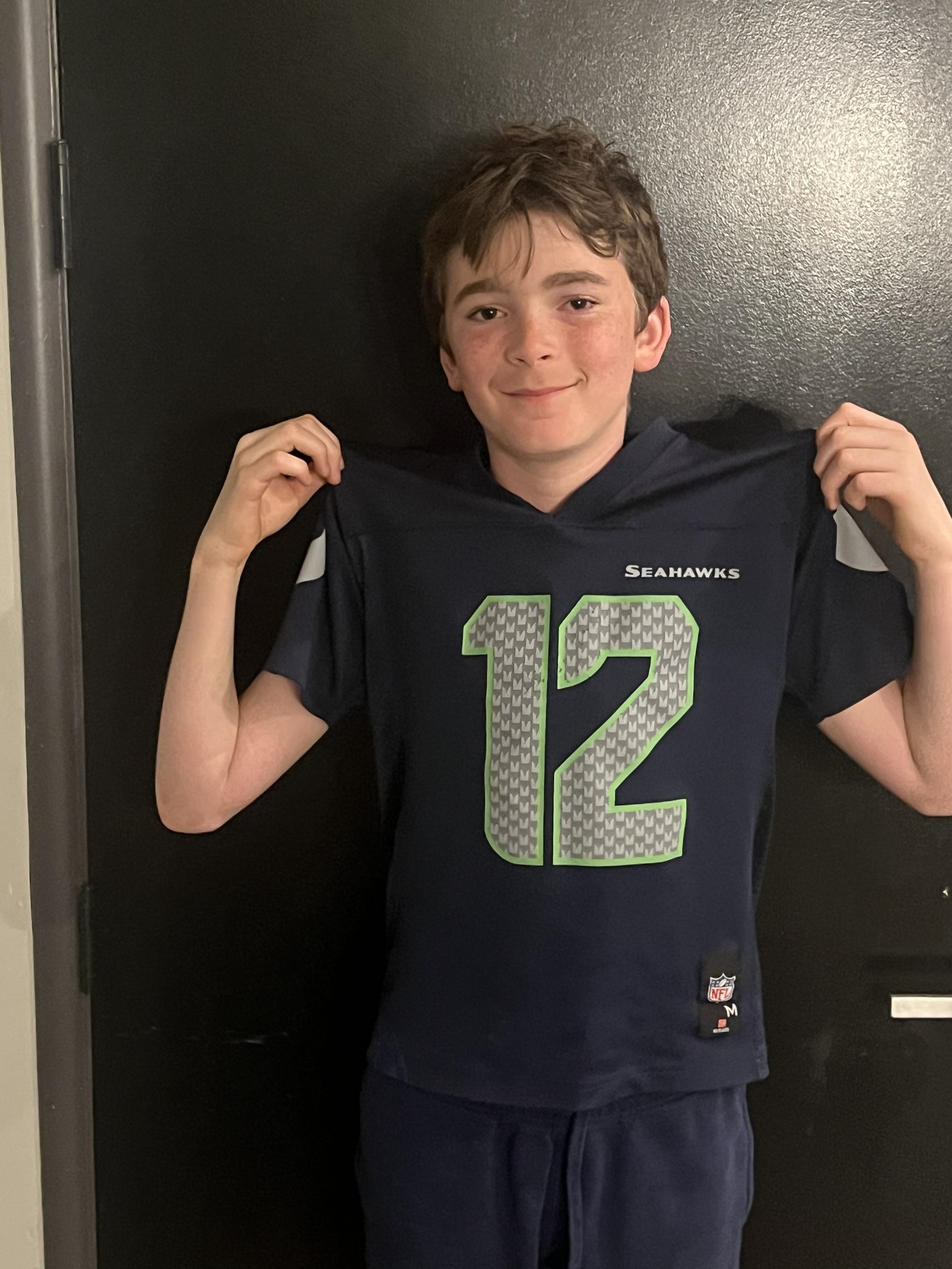 caption: Samuel Bomsztyk Drozd was the 12th baby born at Swedish Hospital 12 years ago when the Seahawks won their first Super Bowl title. Twelve years later, he's wearing jersey No. 12 and hopes his favorite team wins Sunday against the Patriots in Super Bowl LX. 