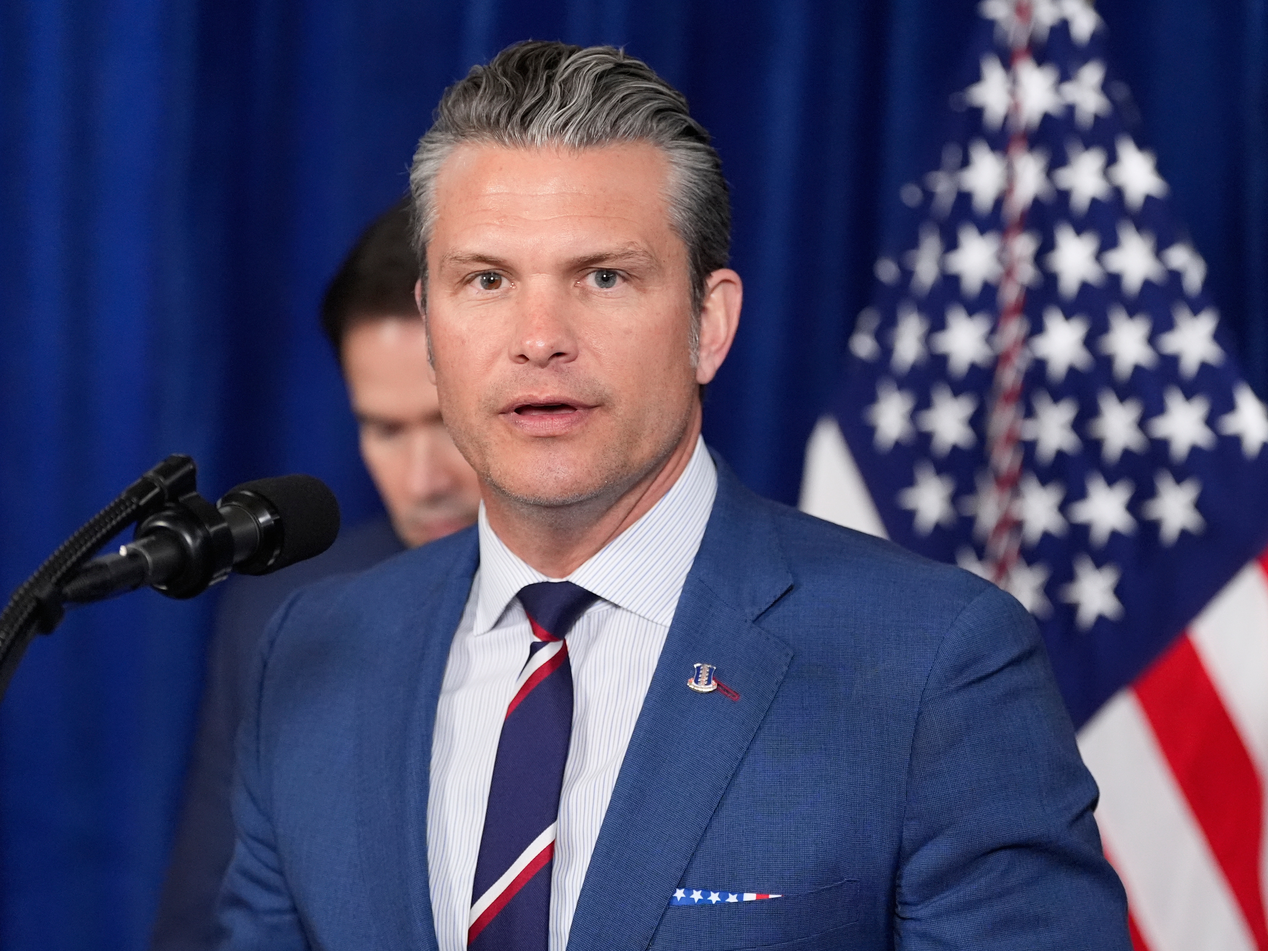 caption: Defense Secretary Pete Hegseth speaks at Mar-a-Lago, Saturday, Jan. 3, 2026, in Palm Beach, Fla.