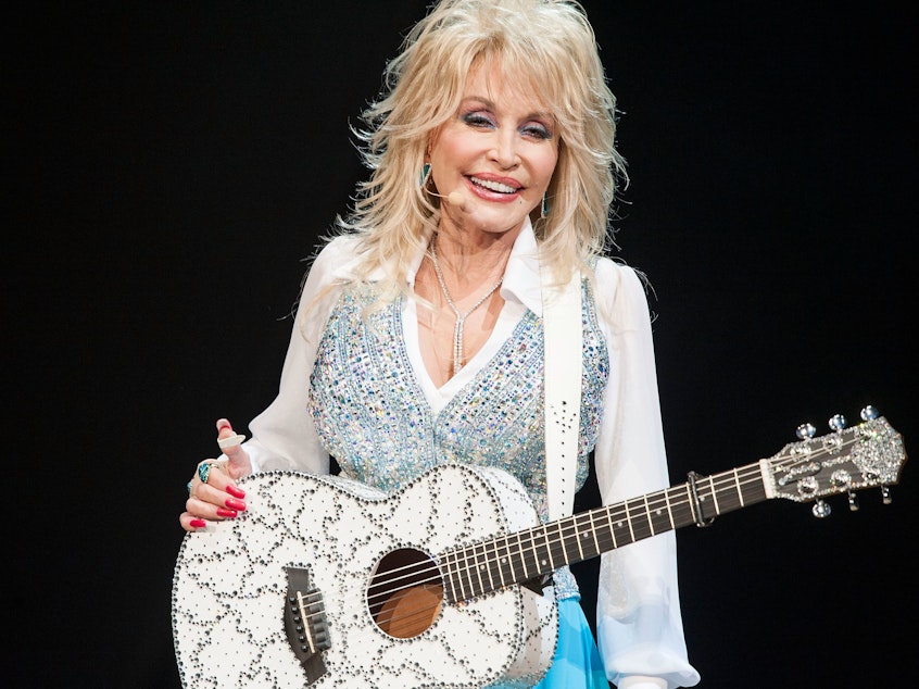 caption: Singer Dolly Parton Performs at Agua Caliente Casino on January 24, 2014 in Rancho Mirage, California.
