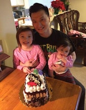 caption: Adam Crapser with two of his step-daughters.