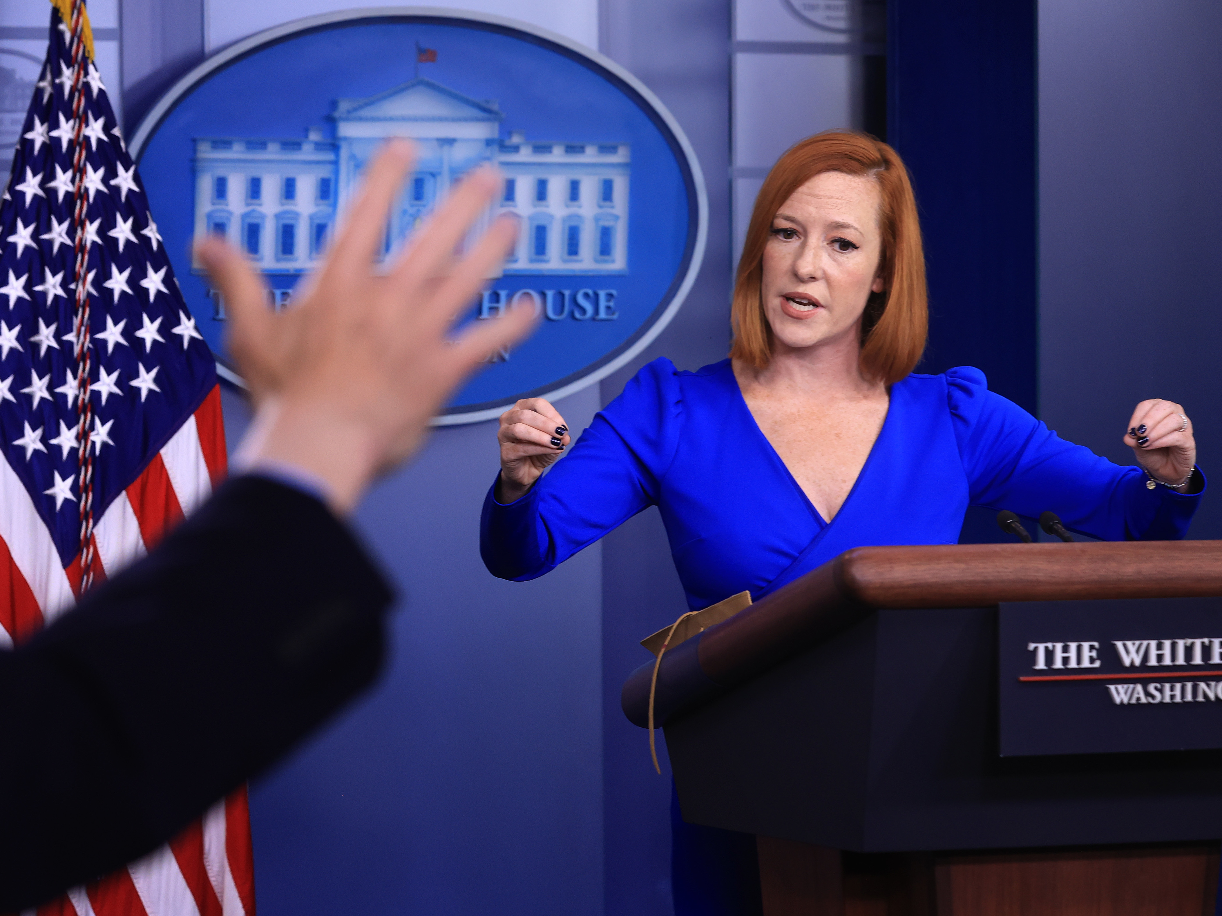 caption: White House press secretary Jen Psaki on Oct. 27, the day she decided she would stay home rather than travel to Europe with President Biden. Today, she revealed she has tested positive for COVID-19.