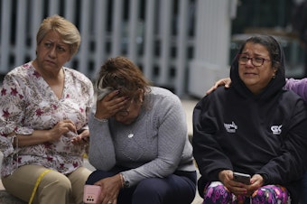 caption: People gather outside after a magnitude 7.6 earthquake was felt in Mexico City on Monday, Sept. 19. The quake hit at 1:05 p.m. local time, according to the U.S. Geologic Survey, which said the quake was centered near the boundary of Colima and Michoacan states.