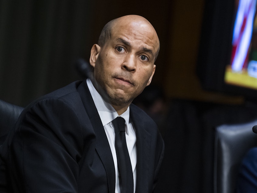 caption: Senator Cory Booker, D-N.J., listens during a Senate Judiciary Committee hearing in Washington on June 2. Booker says the new legislation would "create a far greater level of accountability" for police misconduct.