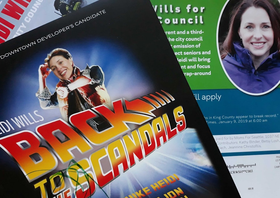 caption: Mailers sent to residents of District 6, which encompasses most of northwest Seattle. The mailer on the left opposes her; the one on the right supports her. The District 6 Seattle City Council has been deluged with political spending.