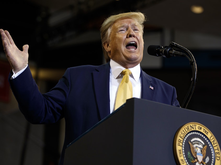 caption: President Trump frequently criticizes the media at his campaign rallies like this one in Louisiana on Friday. His spokeswoman condemned a video that used a fake image of the president attacking opponents and the media.