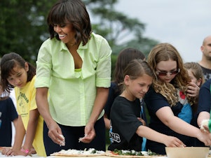 caption: Michelle Obama promoted healthy eating habits when she was first lady. Now, as co-founder of PLEZi Nutrition she aims to give parents healthier food options for their kids.