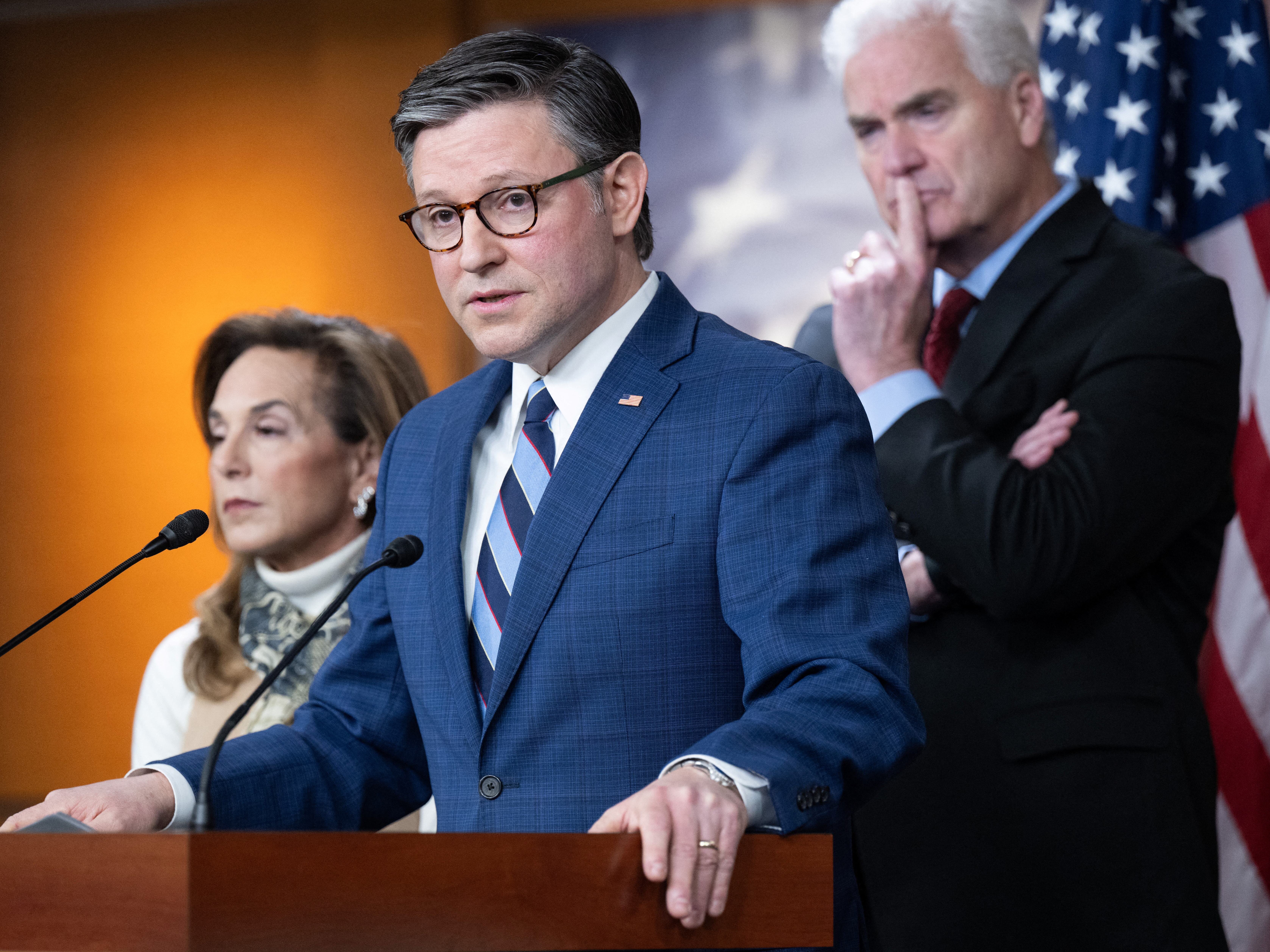 caption: Speaker of the House Mike Johnson, R-La., speaks alongside Republican Conference Chair Representative Lisa McClain, R-Mich., and House Majority Whip Tom Emmer, R-Minn., during a press conference on Capitol Hill in Washington, D.C., on January 21, 2026.
