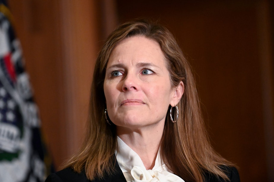 caption: Seventh U.S. Circuit Court Judge Amy Coney Barrett, President Donald Trump's nominee for the U.S. Supreme Court, meets with Sen. Kevin Cramer (R-ND) as she prepares for her confirmation hearing, on Capitol Hill on October 1, 2020 in Washington, DC. (Erin Scott/Pool via Getty Images)