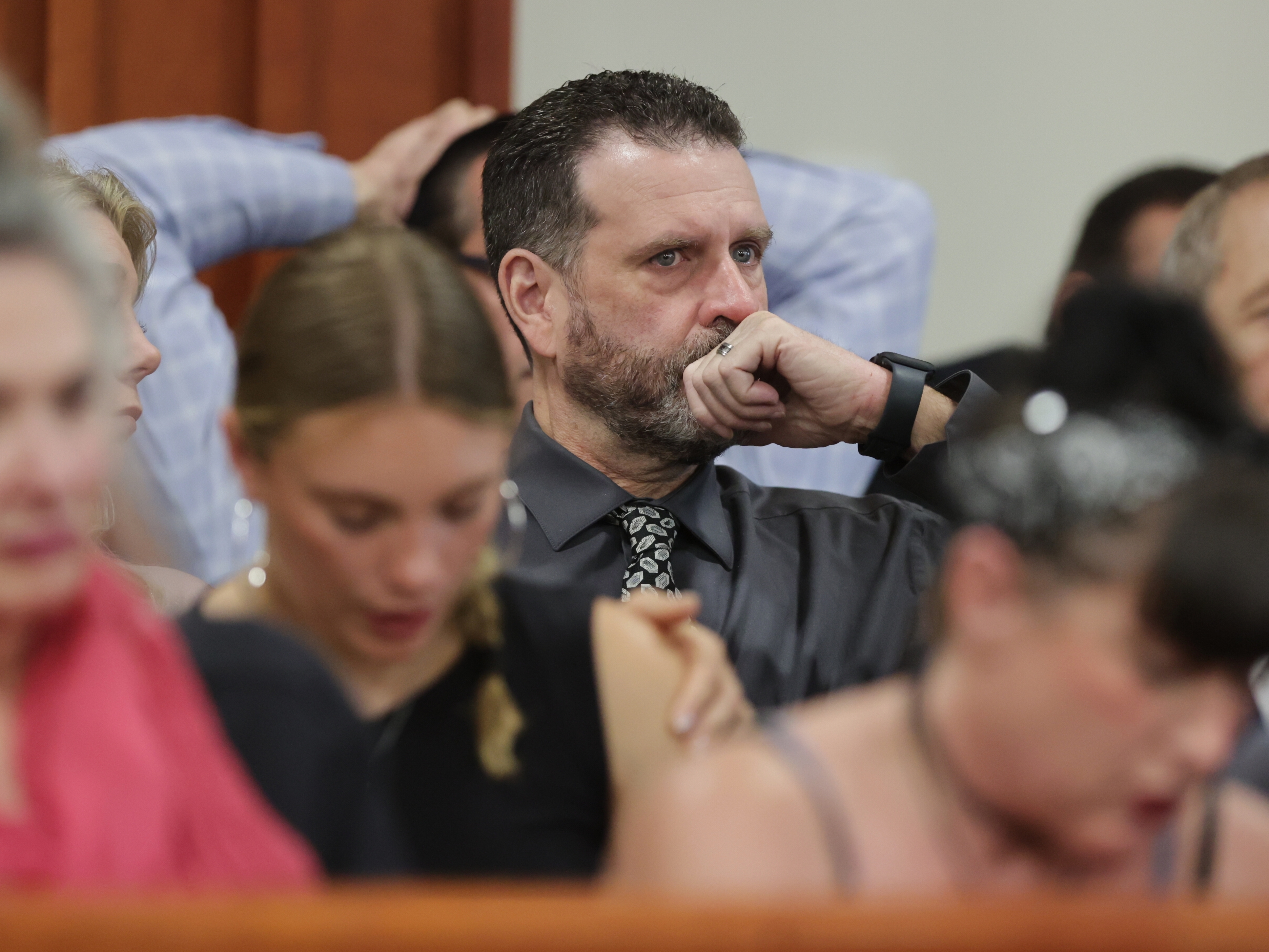caption: Scott Laramie, stepfather of victim Madison Morgan, listens at the sentencing hearing of Bryan Kohberger at the Ada County Courthouse in Boise, Idaho.
