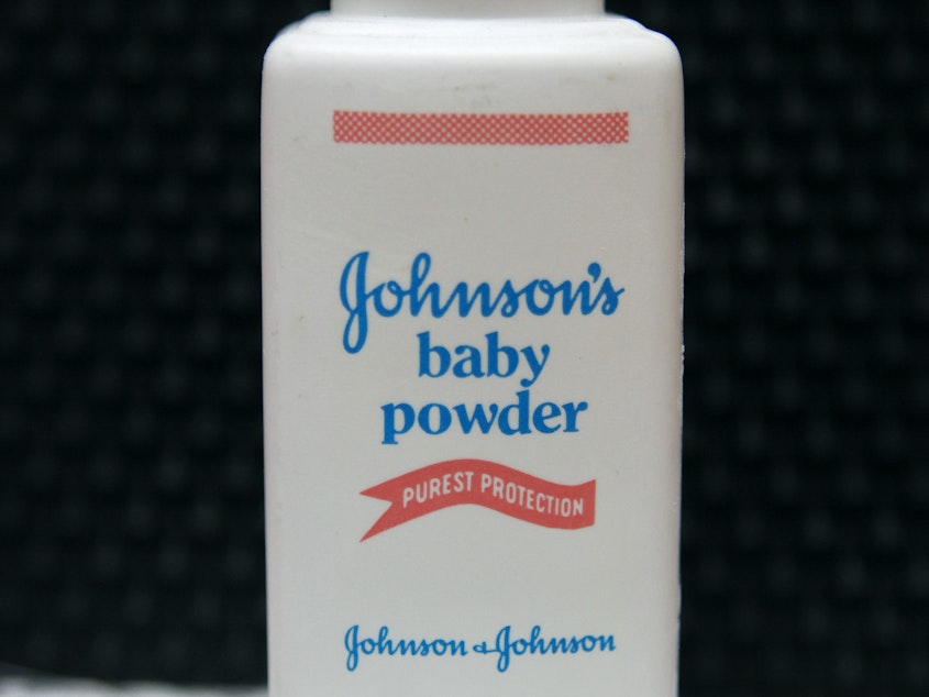 caption: Johnson & Johnson says it will discontinue selling talcum-based baby powder in the United States and Canada.