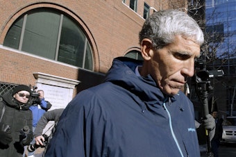 caption: Rick Singer departs federal court in Boston in March 2019 after pleading guilty to charges in a nationwide college admissions bribery scandal. Singer is scheduled to be sentenced Wednesday afternoon in Boston.