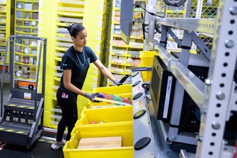 caption: Amazon said it will invest $700 million to train 100,000 employees for higher-skilled jobs by 2025. Training programs will be offered to workers throughout all levels of the company.