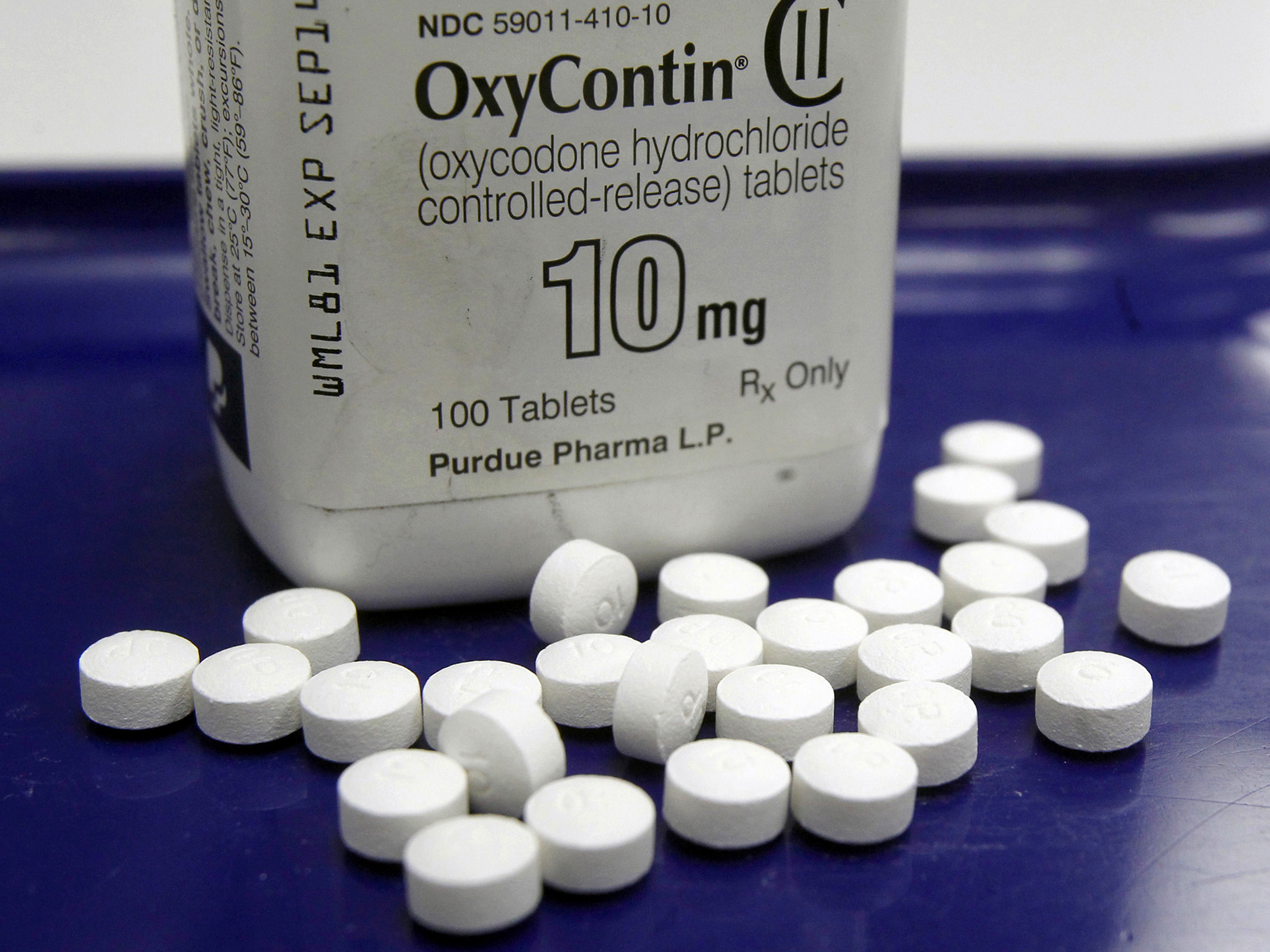 caption: A 2013 file photo shows OxyContin pills at a pharmacy in Montpelier, Vt.